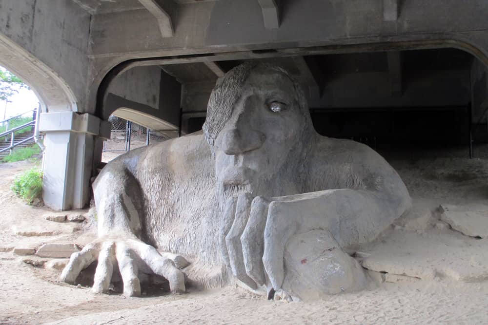 The art installation of the Fremont Troll under the bridge in Seattle, Washington. 