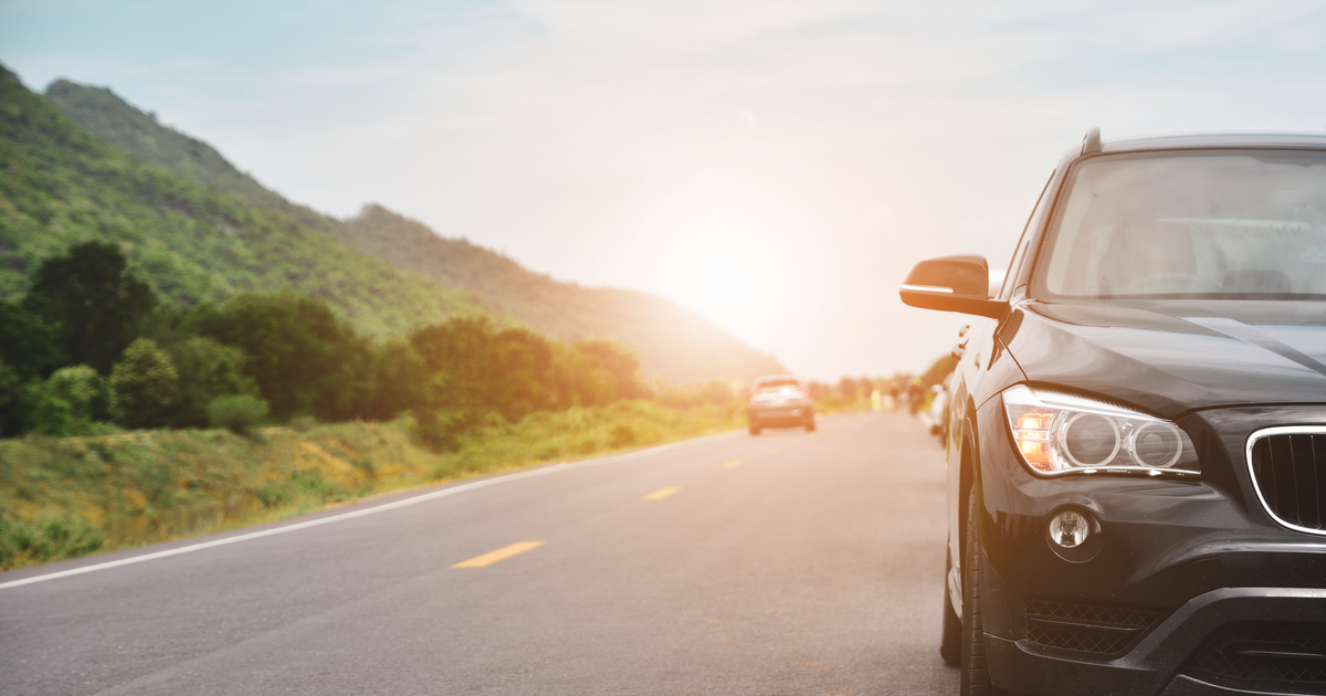 Car driving on road best car for road trips