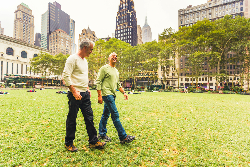 Two senior men having a walk together in New York city