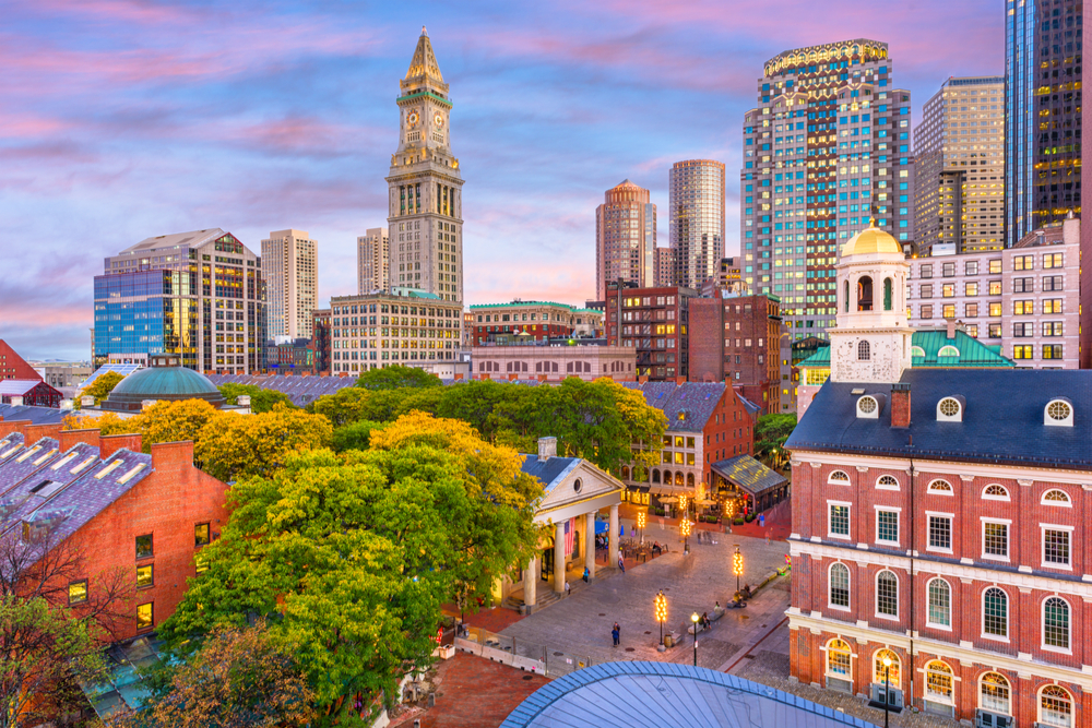 Boston, Massachusetts, USA skyline with Faneuil Hall and Quincy Market at dusk
